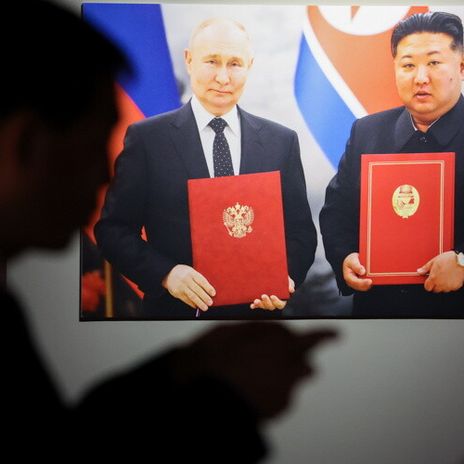 Photograph showing Russia's President Vladimir Putin and North Korean leader Kim Jong Un, at the opening of an exhibition in Moscow. Oct. 2025